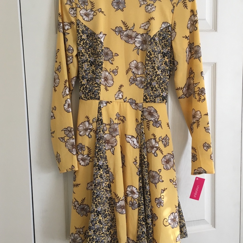 Long sleeve yellow dress with flower detail